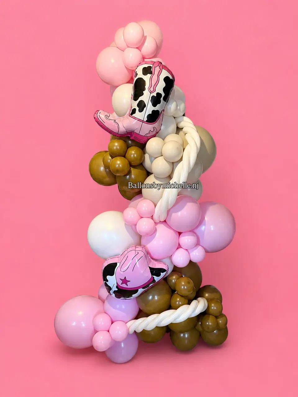 My First Rodeo balloon stack in pink, white and brown